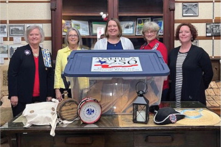 Pictured are Charlene Orr, co-chair of the project (from left to right); Cynthia Goode, King’s Fort Chapter Regent; Camille Chen, Terrell ISD social studies coordinator; Kathy Goldsmith, co-chair of the project; and Jessica King, Terrell Heritage Museum Administrator. Eighteen classrooms will be able to use the America 205! Celebration trunk as an introduction to life during the Revolution. Photo courtesy of Charlene Orr